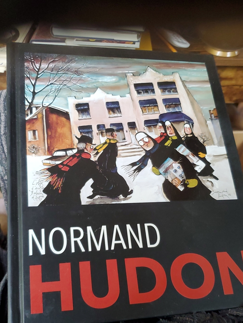 Normand Hudon Art Hardcover Book - Black Cover with Red Title
